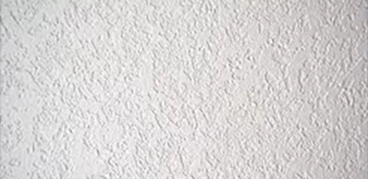 White ceiling with some gray dot texturing